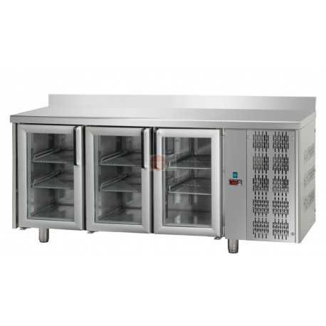 TAVOLO REFRIGERATO - 3 PORTE IN VETRO - ILLUMINAZIONE NEON - PIANO LISCIO E ALZATINA - STRUTTURA INTERAMENTE IN ACCIAIO INOX AISI 304 - MODELLO GASTRONORM (530 X 325 MM) PROFONDITA' 70 CM - TEMPERATURA 0°/+10° - CAPACITA' 460 LT - REFRIGERAZIONE VENTILATA - SBRINAMENTO AUTOMATICO - DIMENSIONI CM L 187 X P 70 X H 85/92